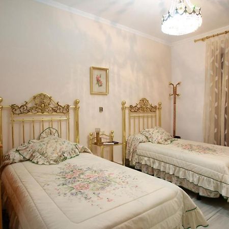 Hostal Jimenez Azuaga Rum bild