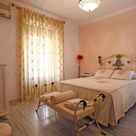 Hostal Jimenez Azuaga Rum bild
