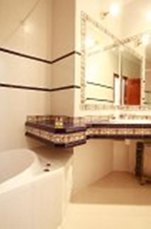 Hostal Jimenez Azuaga Rum bild