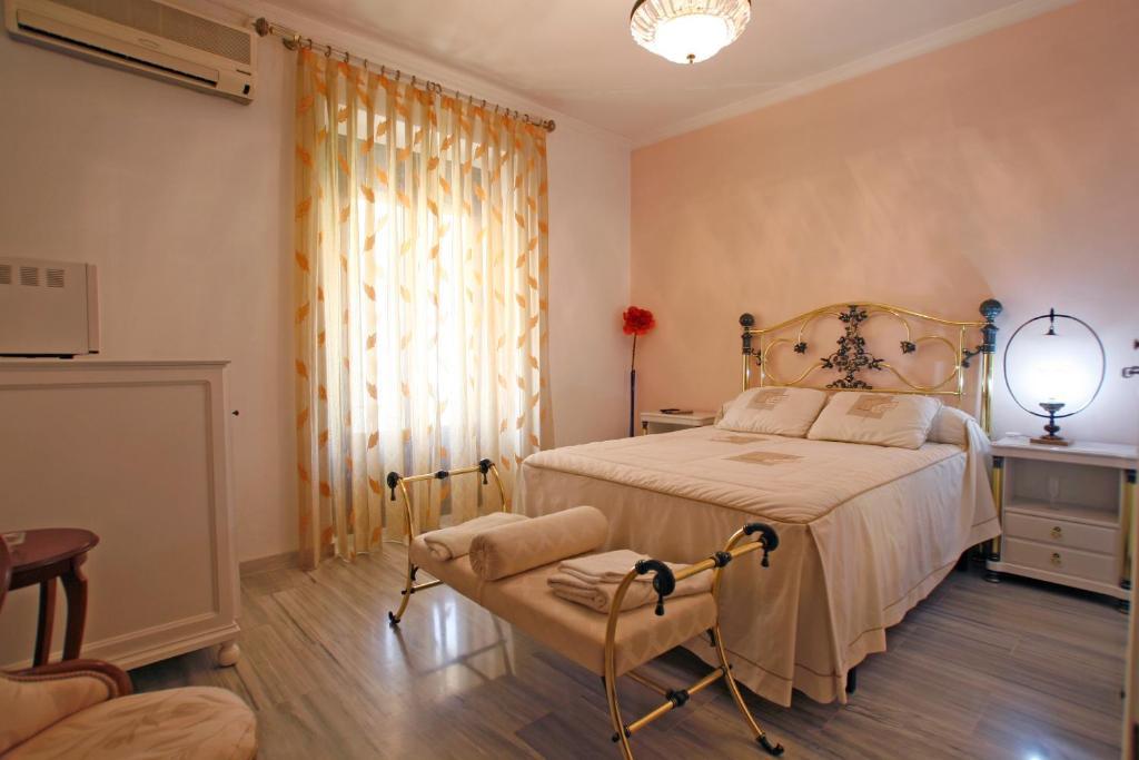 Hostal Jimenez Azuaga Rum bild
