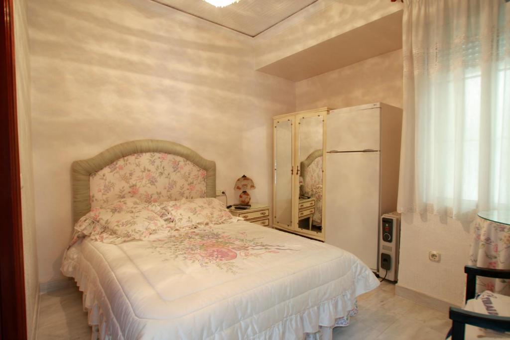 Hostal Jimenez Azuaga Rum bild