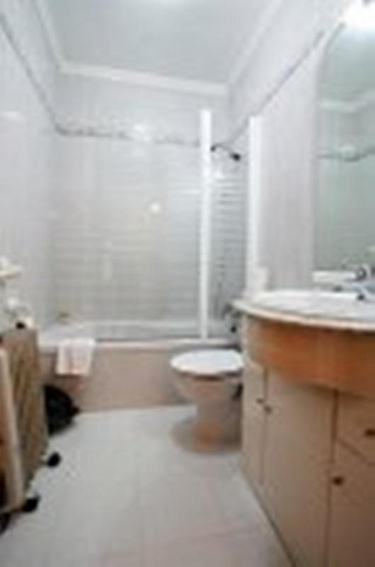 Hostal Jimenez Azuaga Rum bild